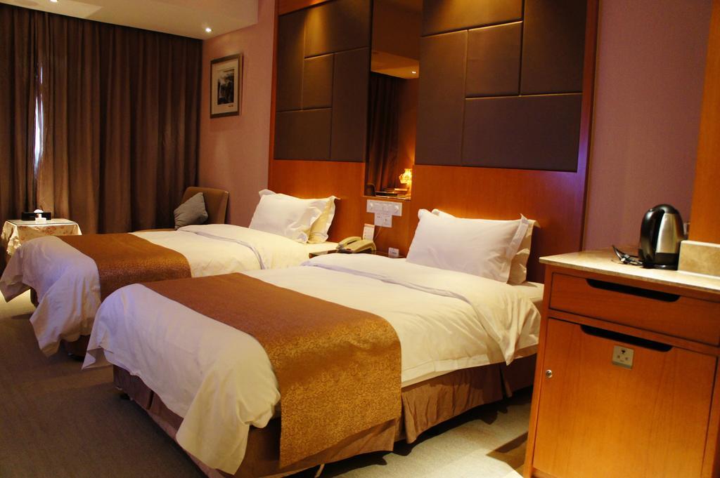 Oriental Hotel Tong Xiang Csiahszin Szoba fotó