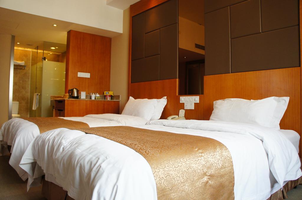 Oriental Hotel Tong Xiang Csiahszin Szoba fotó