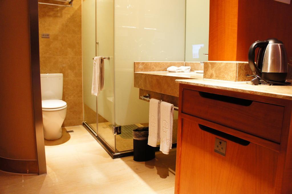 Oriental Hotel Tong Xiang Csiahszin Szoba fotó