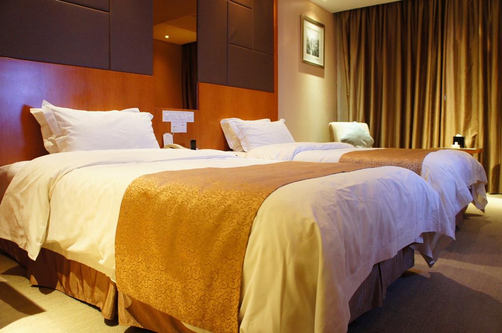 Oriental Hotel Tong Xiang Csiahszin Szoba fotó