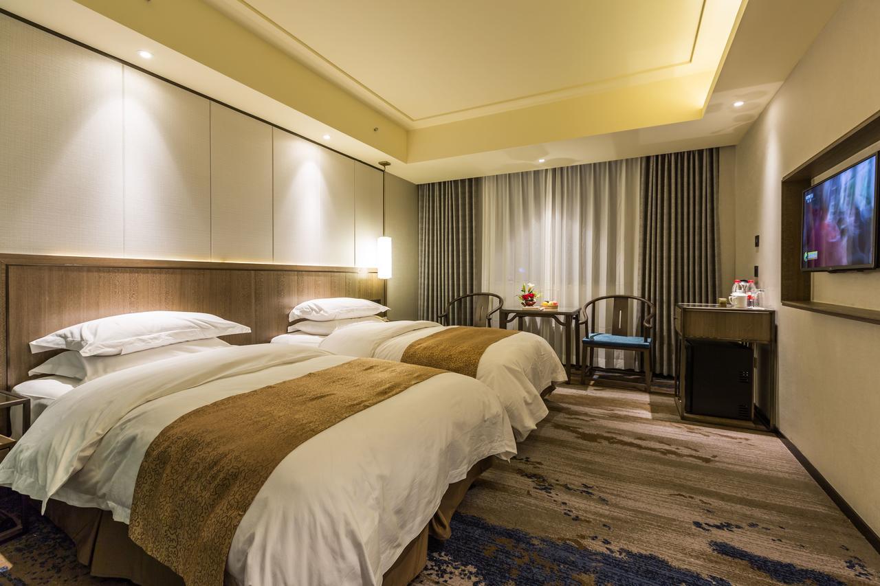 Oriental Hotel Tong Xiang Csiahszin Kültér fotó